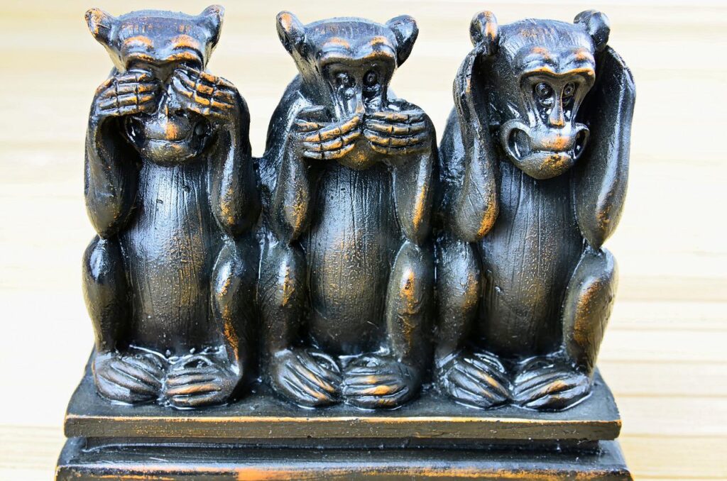 He borrowed from a 17th century phrase; ‘See no evil, hear no evil, speak no evil’. The three wise monkeys.