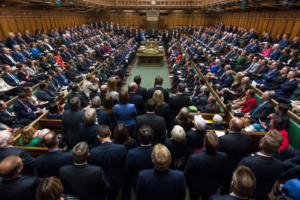 House of Commons during a parliamentary debate, viewed from the back of the chamber with ministers facing rows of MPs. Andy Burnham Labour MPs letter